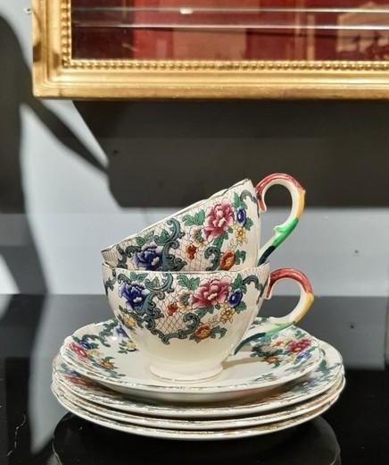 Antique cup and two dishes