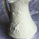 Antique milk jug