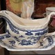 Antique gravy boat on a stand