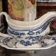 Antique gravy boat on a stand