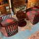 Antique pair art deco armchairs and a table