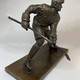 Sculpture "Hockey player-striker"