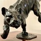 Antique sculpture "Lioness on the hunt"