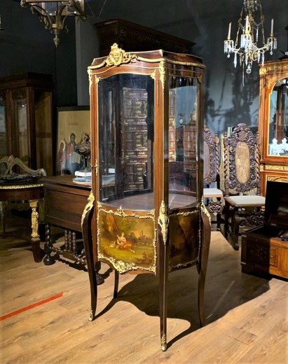 Antique showcase in Louis XV style