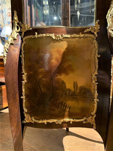 Antique showcase in Louis XV style