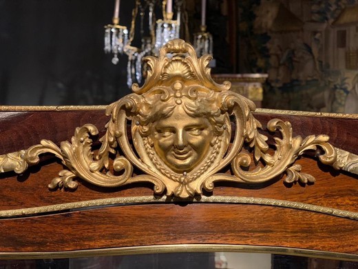 Antique showcase in Louis XV style