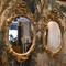 Antique paired mirrors