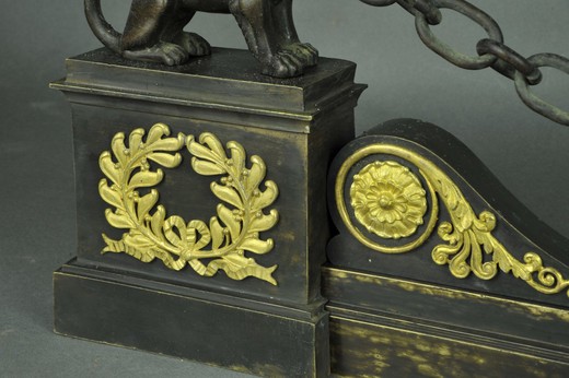 Antique fireplace bar with winged lions