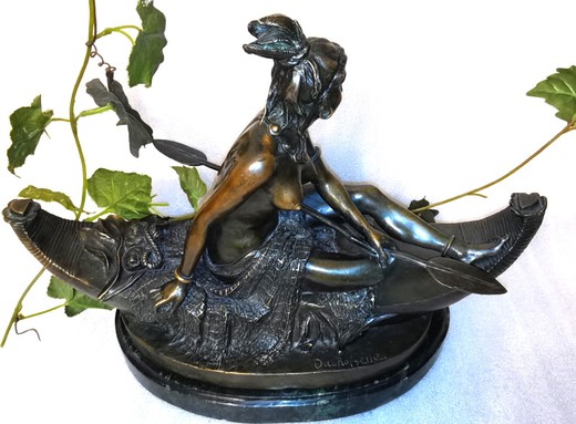 Antique sculpture "Indians in a canoe"