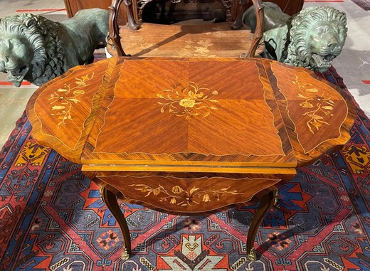 Antique table with folding parts