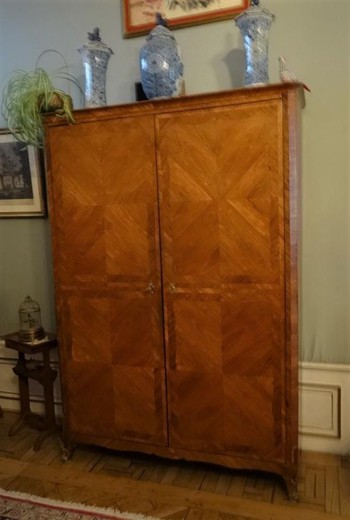 An Anitkvar cabinet in the style of Louis XV