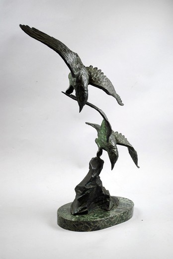Antique flying seagulls sculpture
