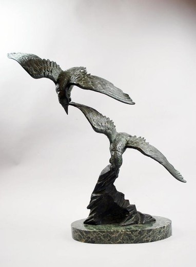Antique flying seagulls sculpture