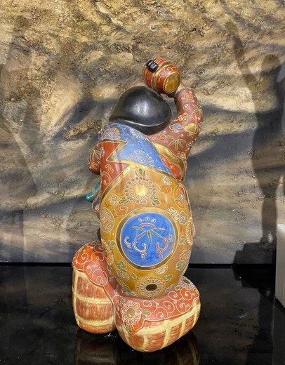 Antique sculpture "Daikoku with a mallet"