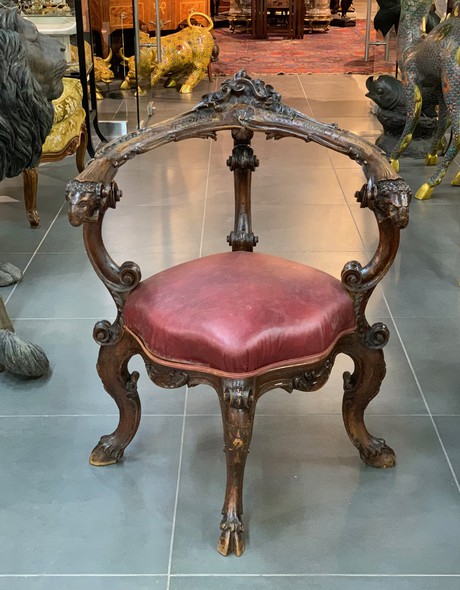 Antique armchair with mascarons