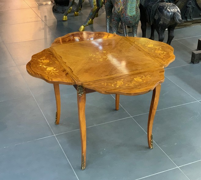 Antique butterfly store table