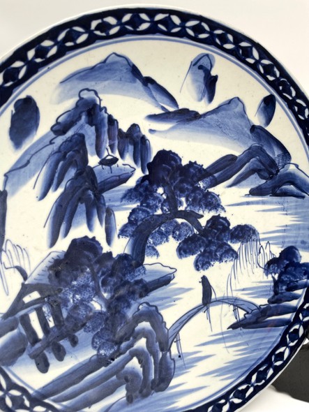 Antique white and blue plate. Arita.