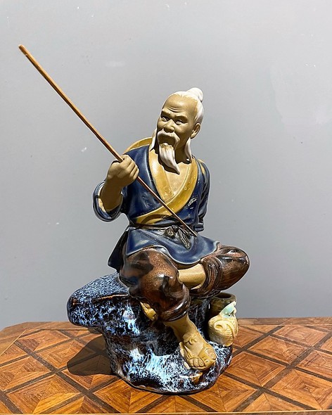 Antique sculpture "Fisherman"