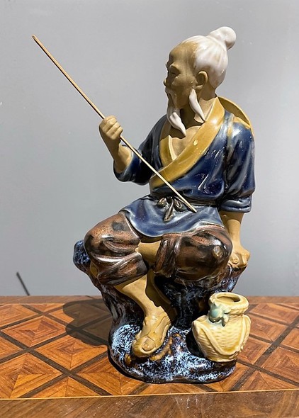 Antique sculpture "Fisherman"