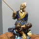 Antique sculpture "Fisherman"