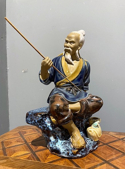 Antique sculpture "Fisherman"