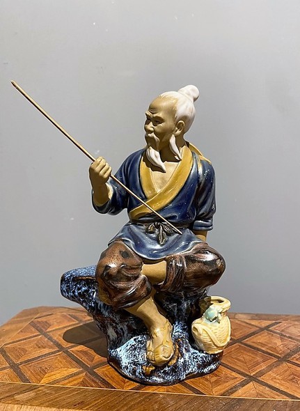 Antique sculpture "Fisherman"