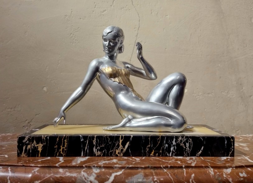 Antique sculpture "Girl in a swimsuit"