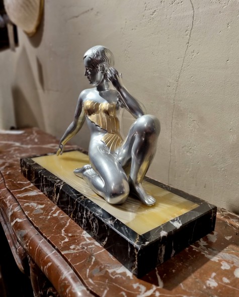 Antique sculpture "Girl in a swimsuit"