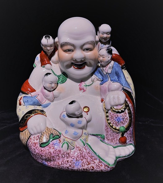 Antique sculpture "Hotei with children"