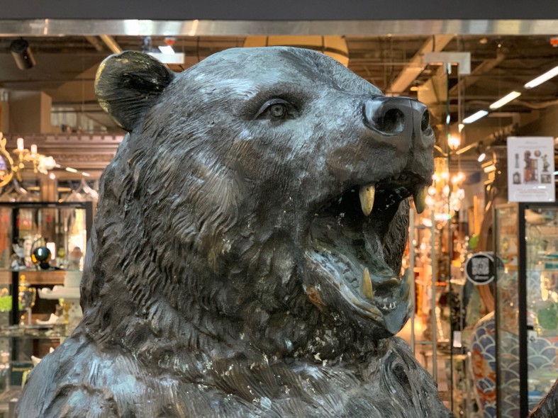 Large bronze sculpture of a bear