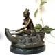 Antique sculpture "Indian woman in a canoe"