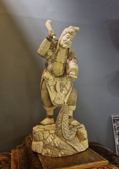 Antique sculpture "The Fisherman"