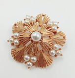 Vintage brooch "Star with pearls"