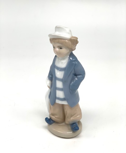 Vintage figurine "Boy with a bag"