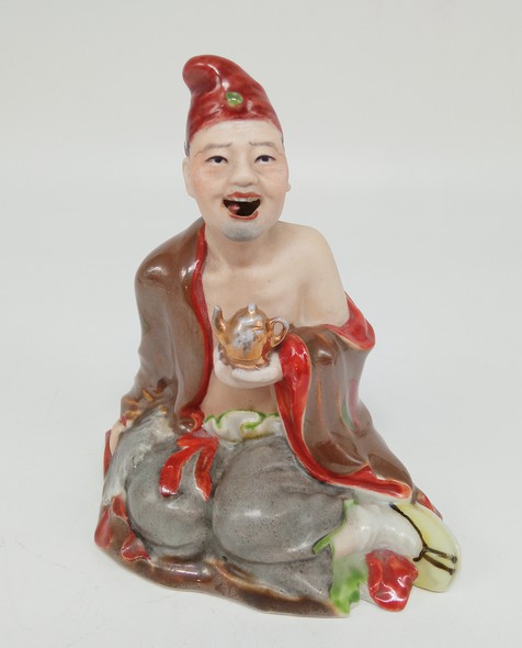 Antique figurine "Chinese with a teapot"