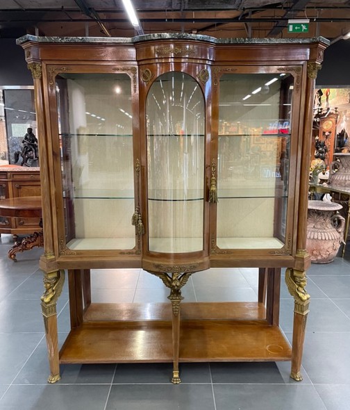 Antique display cabinet in the Empire style