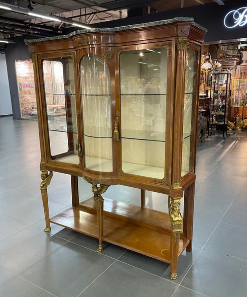 Antique display cabinet in the Empire style