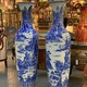 Antique floor-mounted paired vases