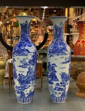 Antique floor-mounted paired vases
