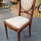 Antique paired Empire style chairs