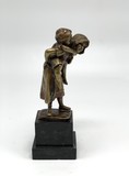 Antique sculpture "Children running from a thunderstorm"