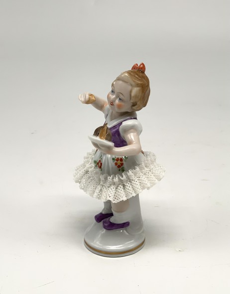 Antique sculpture "Girl with a cake"