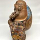 Antique sculpture "Hotei"