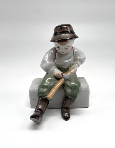 Vintage figurine "Boy with a pipe"