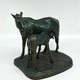 Antique sculpture "Mare with foal"