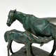 Antique sculpture "Mare with foal"