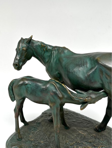 Antique sculpture "Mare with foal"