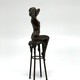 Антикварная скульптура «Обнаженная на стуле»