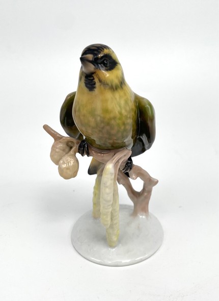 Antique figurine "Bird on a branch"