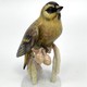 Антикварная статуэтка
 «Птица на ветке»